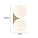Solja – modern glass orb LED bedside wall sconce – gold double head finish